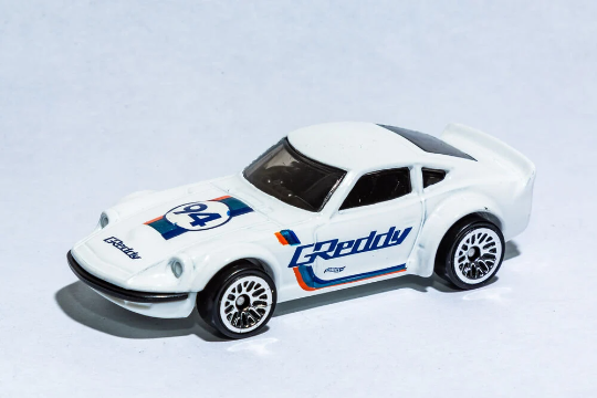Hot Wheels Nissan Fairlady Z HW Speed Graphics FJW49 - Más (+) una Hot Wheel de bonificación