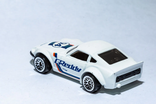 Hot Wheels Nissan Fairlady Z HW Speed Graphics FJW49 - Más (+) una Hot Wheel de bonificación
