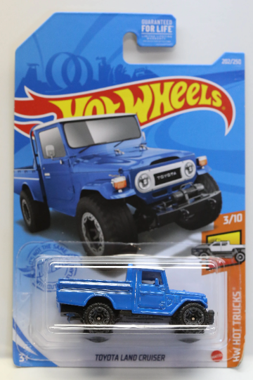 Hot Wheels Toyota Land Cruiser HW Hot Trucks GRY93 - Plus (+) un Hot Wheel en bonus