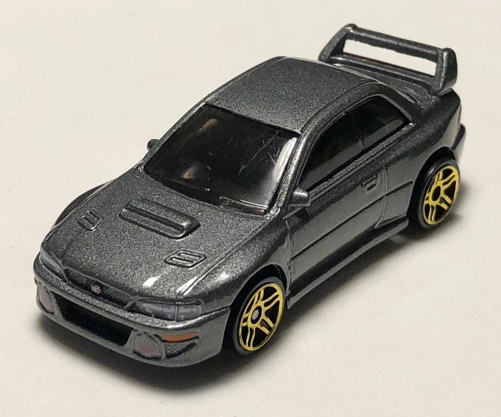 Hot Wheels Subaru Impreza 22B-STi '98 Versión HW J-Imports GTC74 - Más (+) un Hot Wheel de bonificación