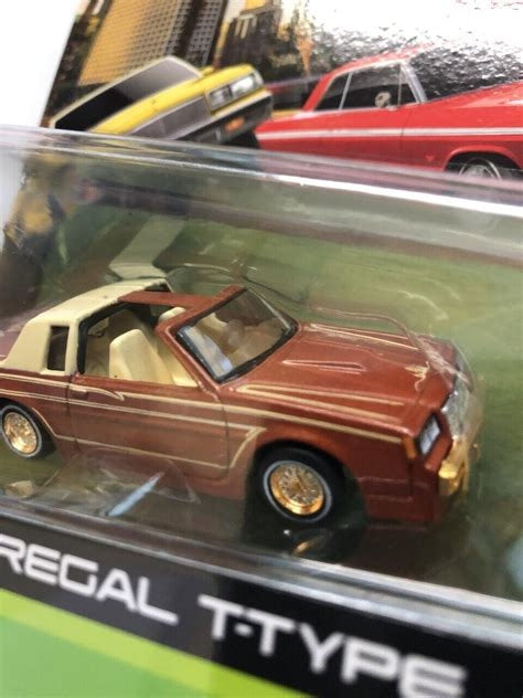 Maisto 1987 Buick Regal T-Type Lowrider - Metallic Copper and Tan - "Lowriders" Series - 15494-21BRT Chase