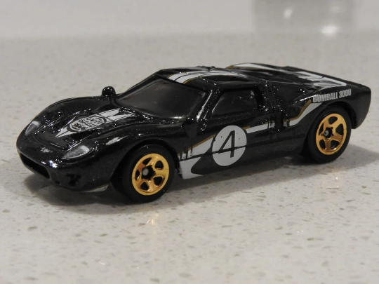 Hot Wheels Ford GT-40 HW Then and Now GTC66 - Plus (+) a Bonus Hot Wheel - Gumball 3000