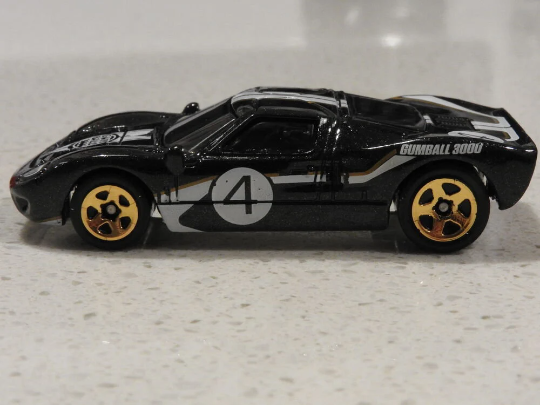 Hot Wheels Ford GT-40 HW Then and Now GTC66 - Plus (+) a Bonus Hot Wheel - Gumball 3000